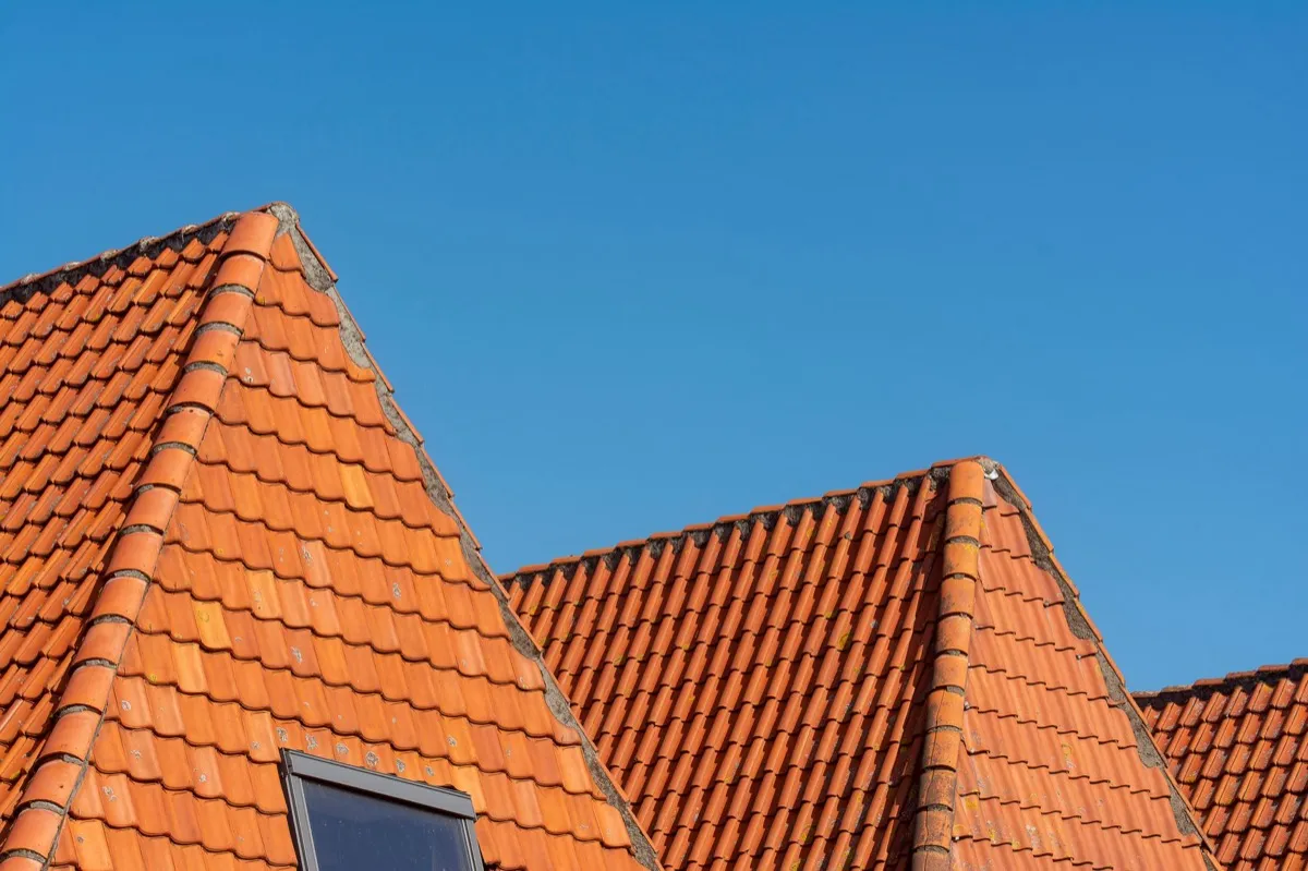 Clay barrel tile rooflines on homes in Toms River, NJ